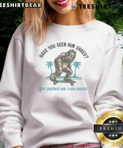 Funny Bigfoot skateboarding in a vibrant sweatshirt, showcasing his shredding skills with a playful expression.