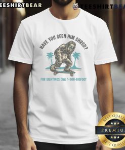 Funny Bigfoot skateboarding in a colorful graphic on a 'Have You Seen Him Shred' T-shirt design for outdoor enthusiasts.