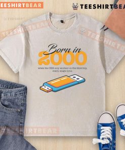Funny 'Born in 2000' T-shirt depicting USB frustrations, highlighting nostalgia for tech struggles in the early 2000s.