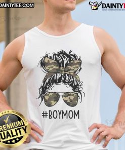 Mom of boys in a tank top with a funny quote, showcasing messy bun hairstyle and playful mom life vibe.