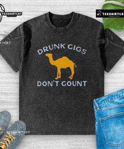 Funny camel graphic on a washed t-shirt, humorously stating 'Cigs Don't Count,' perfect for casual wear.