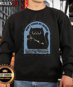 Funny cat on a sweatshirt with the phrase Don't Touch My Books, perfect for book lovers and cat enthusiasts.