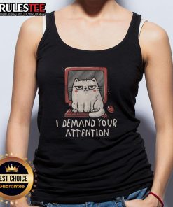 Funny cat sitting on a keyboard, demanding attention, featured on a trendy tank top design for cat lovers.