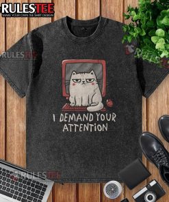 Funny cat on a keyboard with a I Demand Your Attention washed t-shirt, showcasing irresistible feline charm.