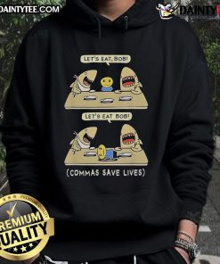 Funny hoodie featuring a shark and a playful punctuation pun: 'Let's eat, Grandma' with commas for English lovers.