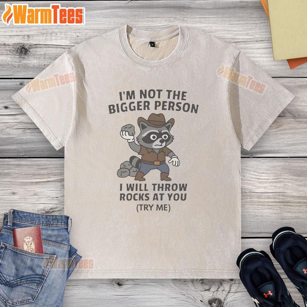 Funny Cowboy Raccoon I’M Not The Bigger Person I Will Throw Rocks At You Washed T-Shirt Funny cowboy raccoon on a washed T-shirt with the phrase I'm not the bigger person, I will throw rocks at you.