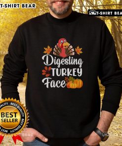 Funny digesting turkey face Thanksgiving sweatshirt featuring a humorous turkey graphic for holiday celebrations.