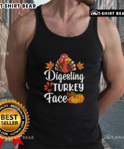 Funny turkey face graphic on a Thanksgiving tank top, perfect for holiday gatherings and celebrating with humor.
