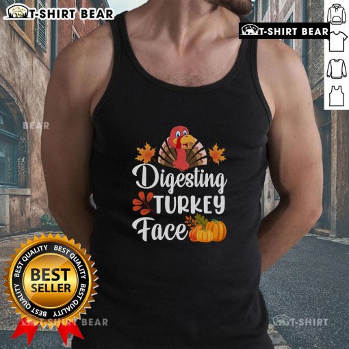 Funny turkey face graphic on a Thanksgiving tank top, perfect for holiday gatherings and celebrating with humor.