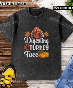 Funny digesting turkey face graphic on a Thanksgiving washed t-shirt, perfect for holiday humor and festive gatherings.