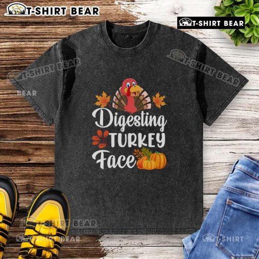 Funny digesting turkey face graphic on a Thanksgiving washed t-shirt, perfect for holiday humor and festive gatherings.