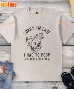 Funny dog wearing a Sorry I'm Late, I Had To Poop t-shirt, showcasing humor and canine charm in a playful setting.