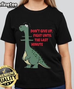 Funny 'Don't Give Up' dinosaur graphic tee for ladies, featuring a dinosaur about to eat a human, perfect for humor lovers.