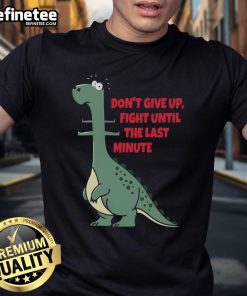 Alt Text: Humorous Don't Give Up dinosaur t-shirt design featuring a dino chasing a human, perfect for fun-loving fans.