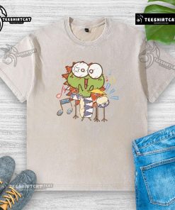 Cute washed t-shirt featuring a funny frog playing a drum, perfect for animal lovers and music enthusiasts.