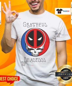 Alt Text: Funny Grateful Deadpool skull logo T-shirt featuring a playful design, perfect for fans of humor and comic book culture.