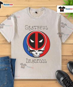 Alt Text: Funny Grateful Deadpool skull logo on a washed t-shirt, perfect for fans of quirky superhero merchandise.