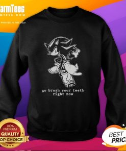 Funny hedgehog graphic on a 'Go Brush Your Teeth Right Now' sweatshirt, perfect for quirky fashion and dental humor.