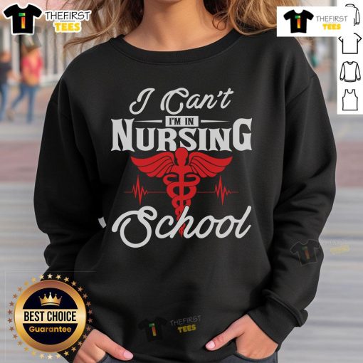 Funny 'I Can't I'm in Nursing School' sweatshirt design featuring playful text, perfect for nursing students and gifts.