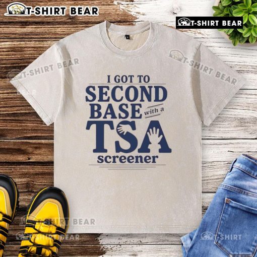 Alt Text: Funny I Got To Second Base With A TSA Screener washed t-shirt featuring humorous graphics and playful text design.