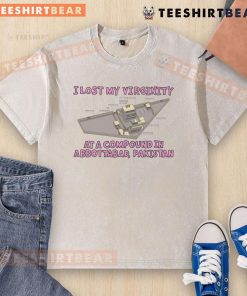 Funny I Lost My Virginity at a Compound in Abbottabad, Pakistan - Humorous washed T-shirt design featuring a playful graphic.