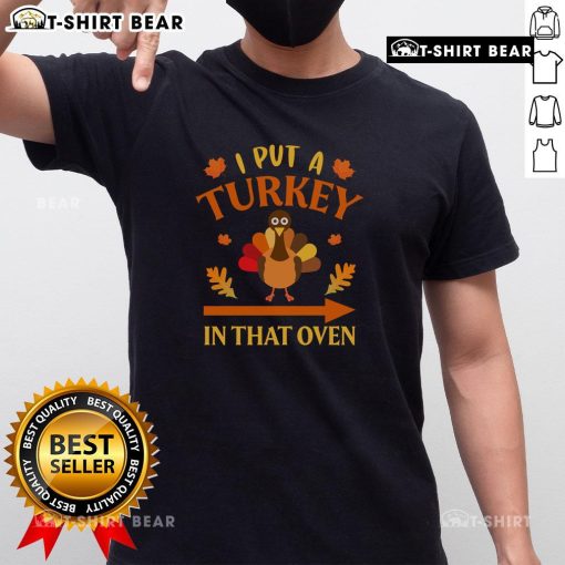 Funny Thanksgiving t-shirt featuring the phrase 'I Put A Turkey In That Oven' perfect for holiday celebrations.