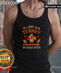 Funny Thanksgiving tank top featuring 'I Put A Turkey In That Oven' design for festive holiday celebrations.