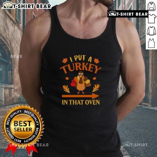 Funny Thanksgiving tank top featuring 'I Put A Turkey In That Oven' design for festive holiday celebrations.