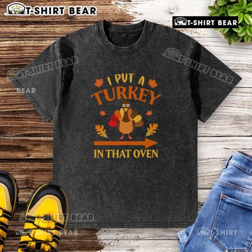 Funny Thanksgiving t-shirt featuring 'I Put A Turkey In That Oven' design, perfect for holiday celebrations.