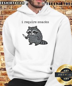 Alt Text: Raccoon in a hoodie holding a knife with a humorous expression, captioned Funny I Require Snacks for hoodie lovers.