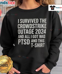 Funny sweatshirt reading 'I Survived the Crowdstrike Outage 2024 and All I Got Was PTSD' in a casual setting.