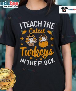 Alt Text: Funny 'I Teach The Cutest Turkeys In The Flock' teacher Thanksgiving ladies tee with a playful turkey graphic.