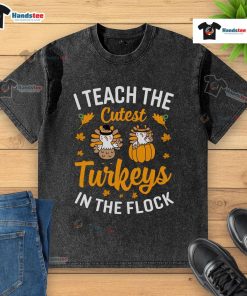 Funny I Teach The Cutest Turkeys In The Flock Teacher Thanksgiving T-Shirt design with cheerful turkey graphics.