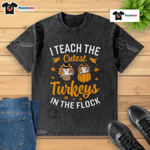 Funny I Teach The Cutest Turkeys In The Flock Teacher Thanksgiving T-Shirt design with cheerful turkey graphics.