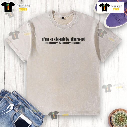Funny I'm A Double Threat Mommy And Daddy Issues washed cotton t-shirt displayed on a hanger, perfect for casual wear.