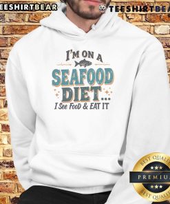 Alt Text: Humorous 'I'm On A Seafood Diet - I See Food, Eat It' hoodie featuring bold text design, perfect for food lovers.