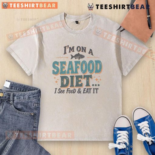 Funny 'I'm on a seafood diet' washed t-shirt featuring a humorous seafood joke for food lovers and shirt enthusiasts.