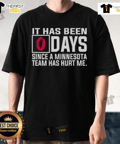 Funny 'It Has Been Days Since A Minnesota Team Has Hurt Me' T-Shirt showcasing humor for Minnesota sports fans.