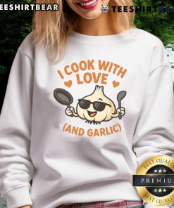 Funny kitchen humor sweatshirt featuring 'I Cook With Love And Garlic' design, perfect for cooking enthusiasts.