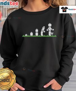 Funny Lego sweatshirt featuring humorous human evolution design with colorful Lego figures and playful graphics.