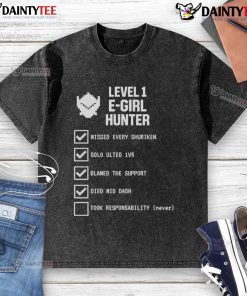 Funny Level 1 E-Girl Hunter Gamer Meme Checklist on a washed t-shirt, featuring humorous gaming references and graphics.