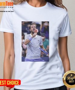 Funny Medvedev licking ice cream on the field during US Open, showcasing a lighthearted moment in tennis.