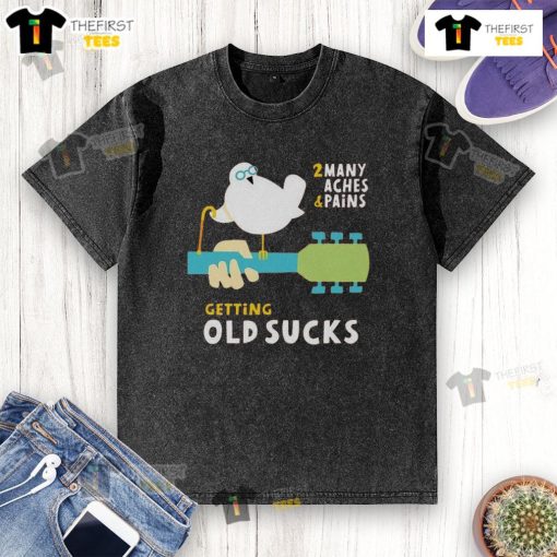 Funny old bird wearing a Getting Old Sucks washed T-shirt, showcasing the humor in aging with many aches and pains.