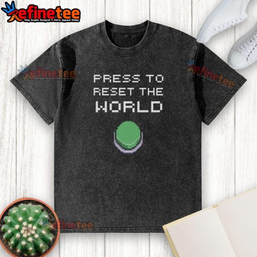 Alt Text: Funny 8-bit 'Press To Reset The World' t-shirt design, showcasing a humorous take on world reset in vibrant colors.