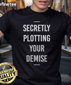 Funny Secretly Plotting Your Demise T-Shirt featuring a humorous graphic design perfect for quirky fashion lovers.