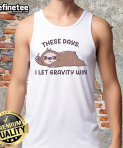 Funny sloth graphic on a tank top with the phrase These days I let gravity win, perfect for casual wear.