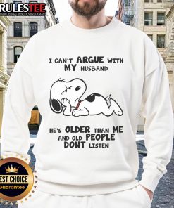 Alt Text: Funny Snoopy sweatshirt with the quote I can't argue with my husband, he's older than me, and old people don't listen.