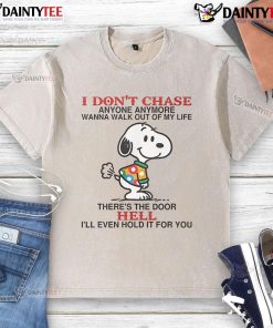 Funny Snoopy 'I Don't Chase Anyone Anymore' washed t-shirt featuring a playful graphic and vibrant colors.
