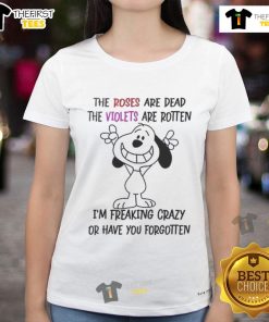 Funny Snoopy graphic tee showing Snoopy saying 'I see what the problem is here, I'm talking in English' for humor lovers.