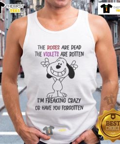 Alt Text: Funny Snoopy tank top with the quote I'm talking in English and you're listening in stupidity design.